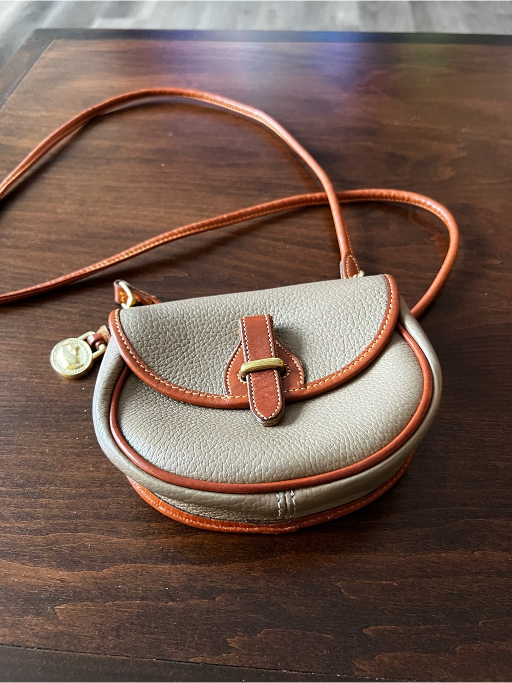 Dooney & Bourke Taupe Crossbody Saddle Bag with Brown Trim